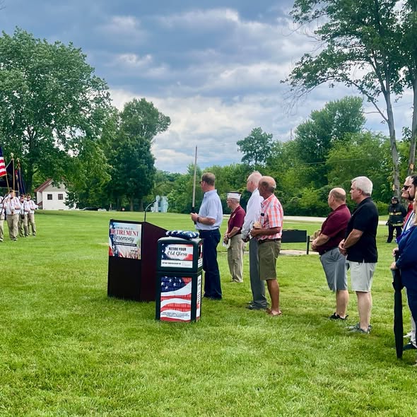 Senator Elder Vogel stood with local participants for an American Flag Retirement Ceremony